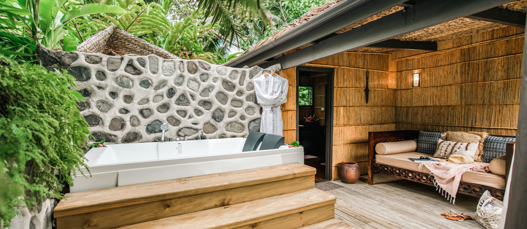 Luxury treehouse outdoor bath at Matangi Island Resort